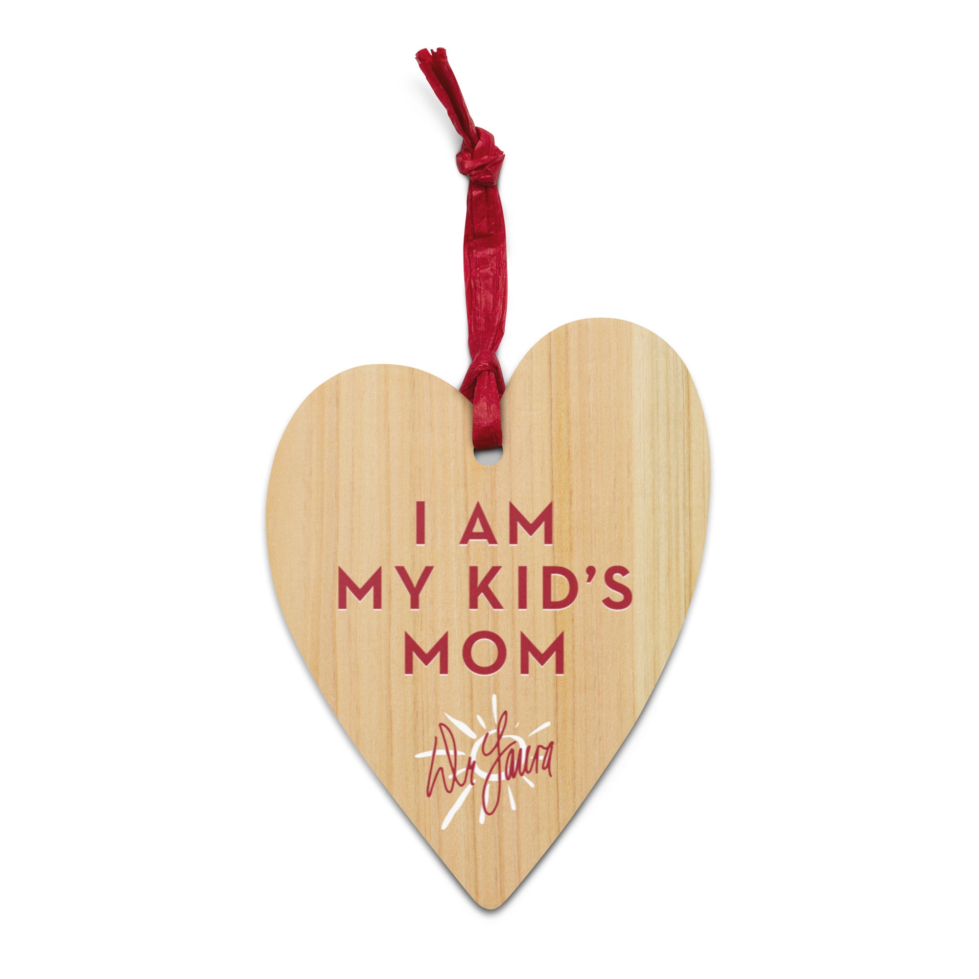 Heart-shaped wooden ornament with the text 'I AM MY KID'S MOM' and a red ribbon and the 'Dr. Laura' signature sunburst logo.